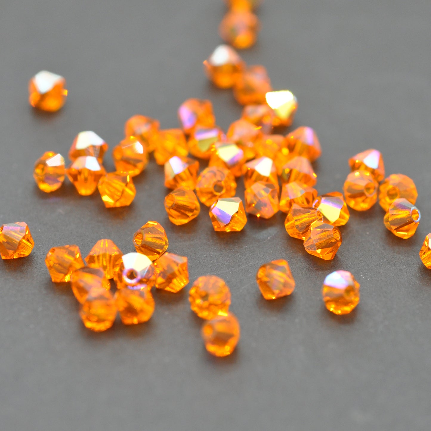 Preciosa Bicone Rondelle Bead / Sun AB / 50 pcs. / Ø 4mm