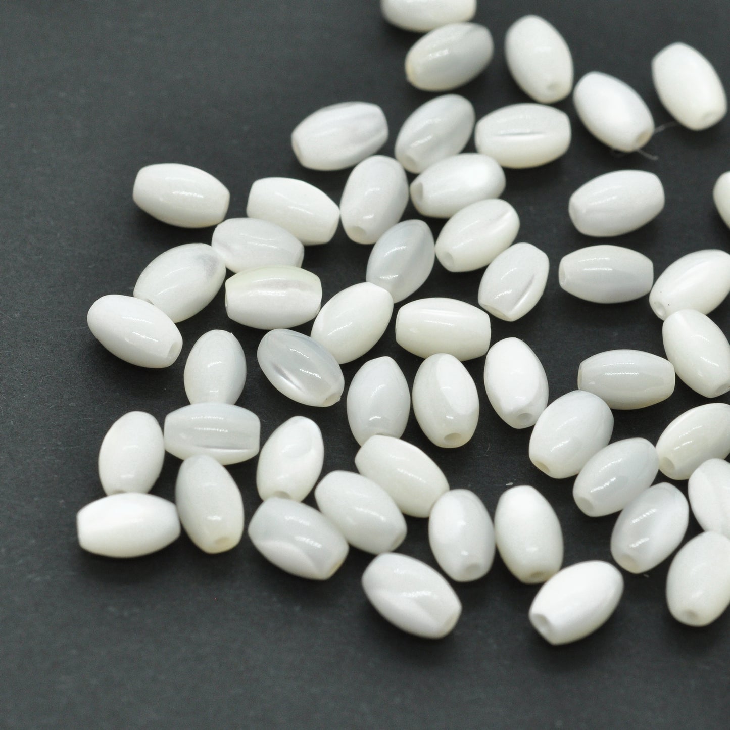 Mother of pearl oval / natural polished / 3x5 mm