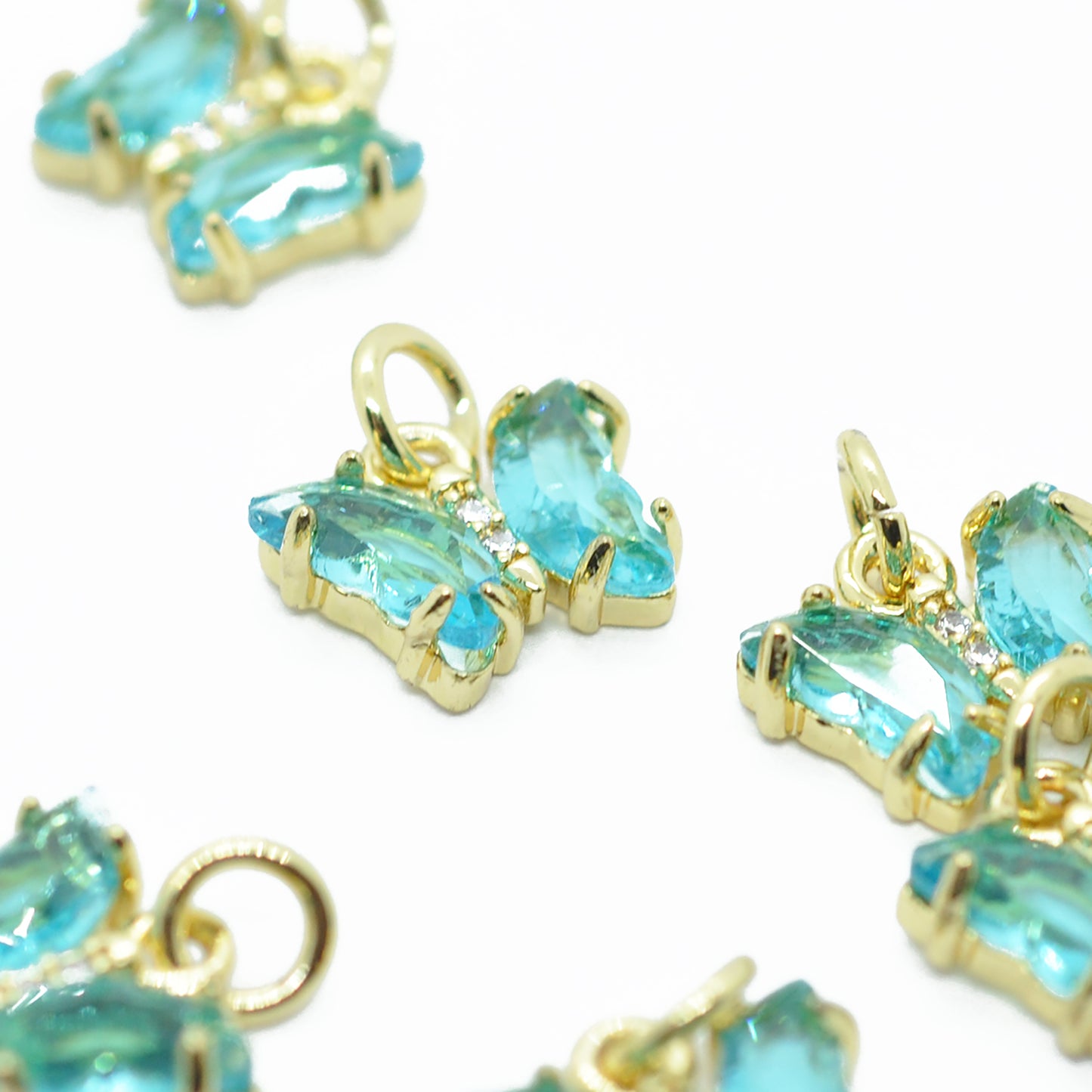 Pendant butterfly zircon / turquoise gold / 12 mm