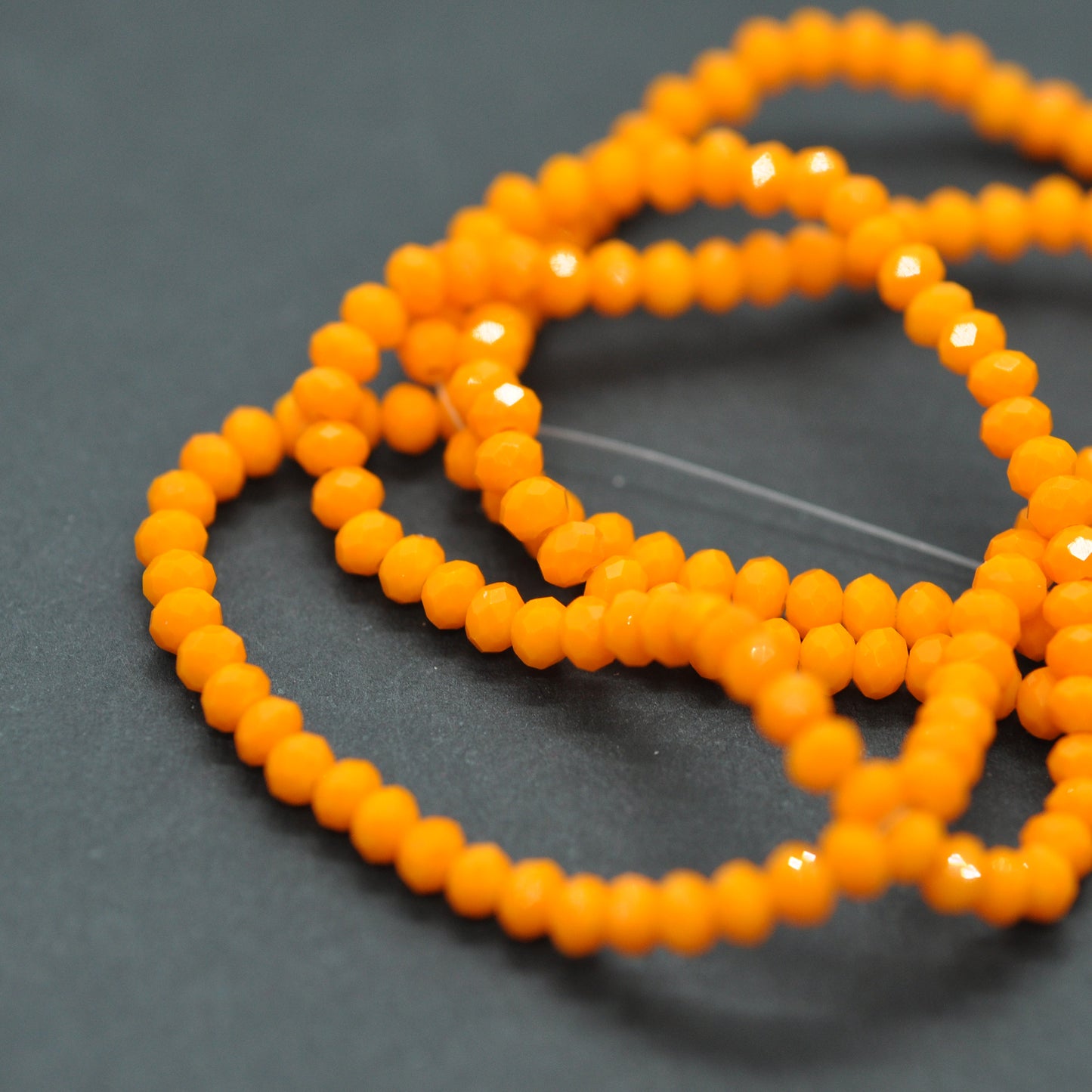 Briolette Strang / orange opak / Ø 2 mm