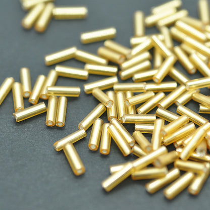Rocailles Stifte / gold silbereinzug 5x2mm / 11gr.