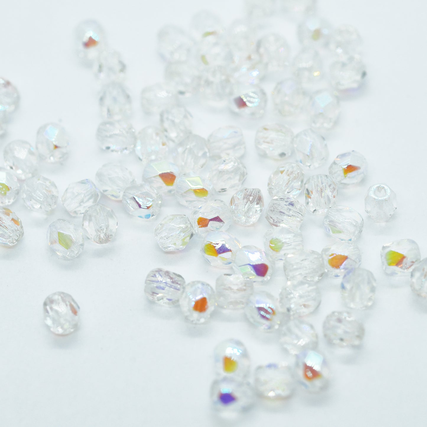 Preciosa ground glass beads / crystal AB / 100 pcs. / 3mm