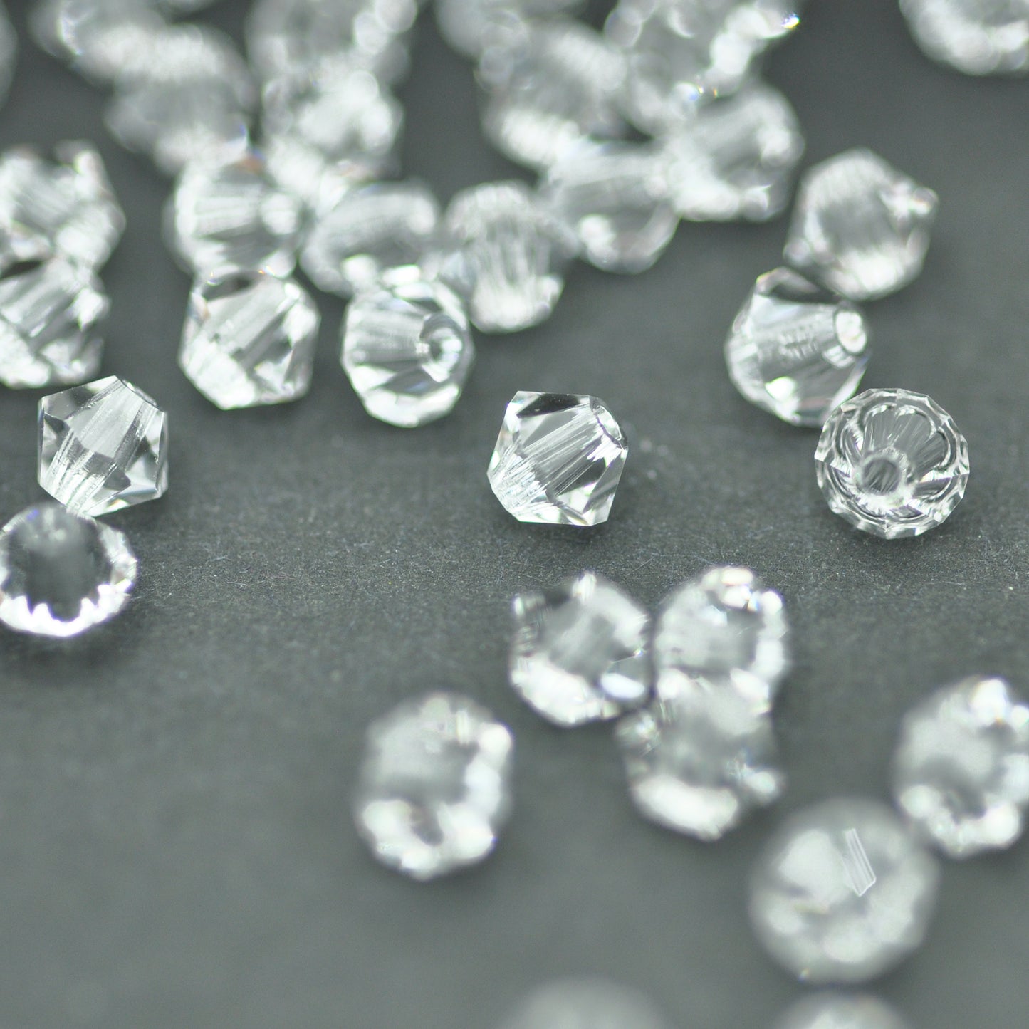 Preciosa Bicone Rondelle Bead / Crystal / 50 pcs. / Ø 4mm