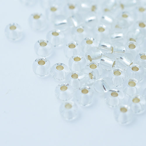 Preciosa Rocailles / crystal silver feed 5/0 / Ø 4.5mm / 15gr.
