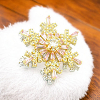 Christmas brooch snowflake strass rotating / gold colored / 30mm