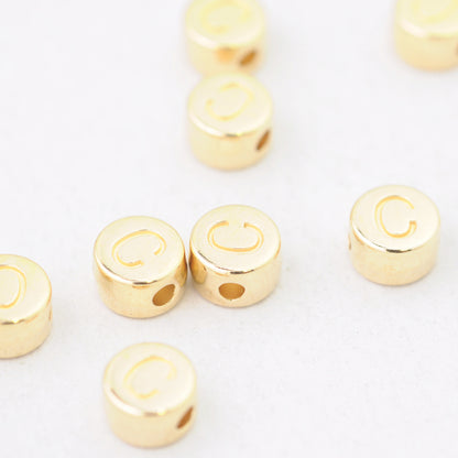 Buchstabe Element / 24k vergoldet / Ø 7 mm
