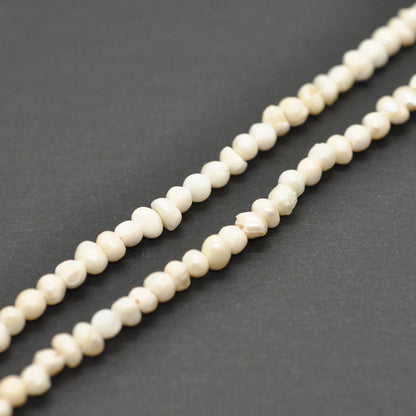 Süßwasserperlen Strang unregelmässig / creme / 2-3mm  / 36cm