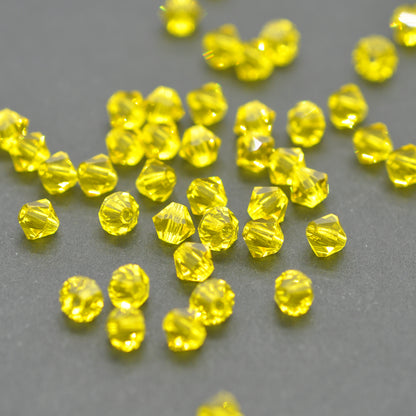 Preciosa Bicone Rondelle Bead / Citrine yellow / 50 pcs. / Ø 4mm