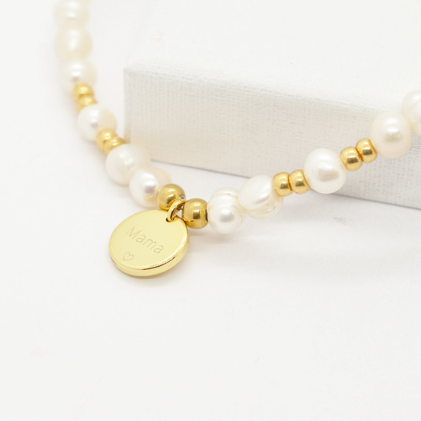 Mama bracelet made of freshwater pearls / gold plated