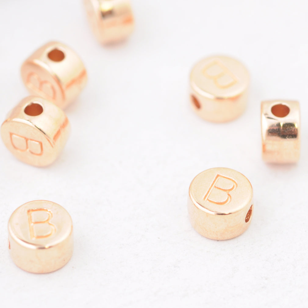 Letter A / rose metal / Ø 7mm