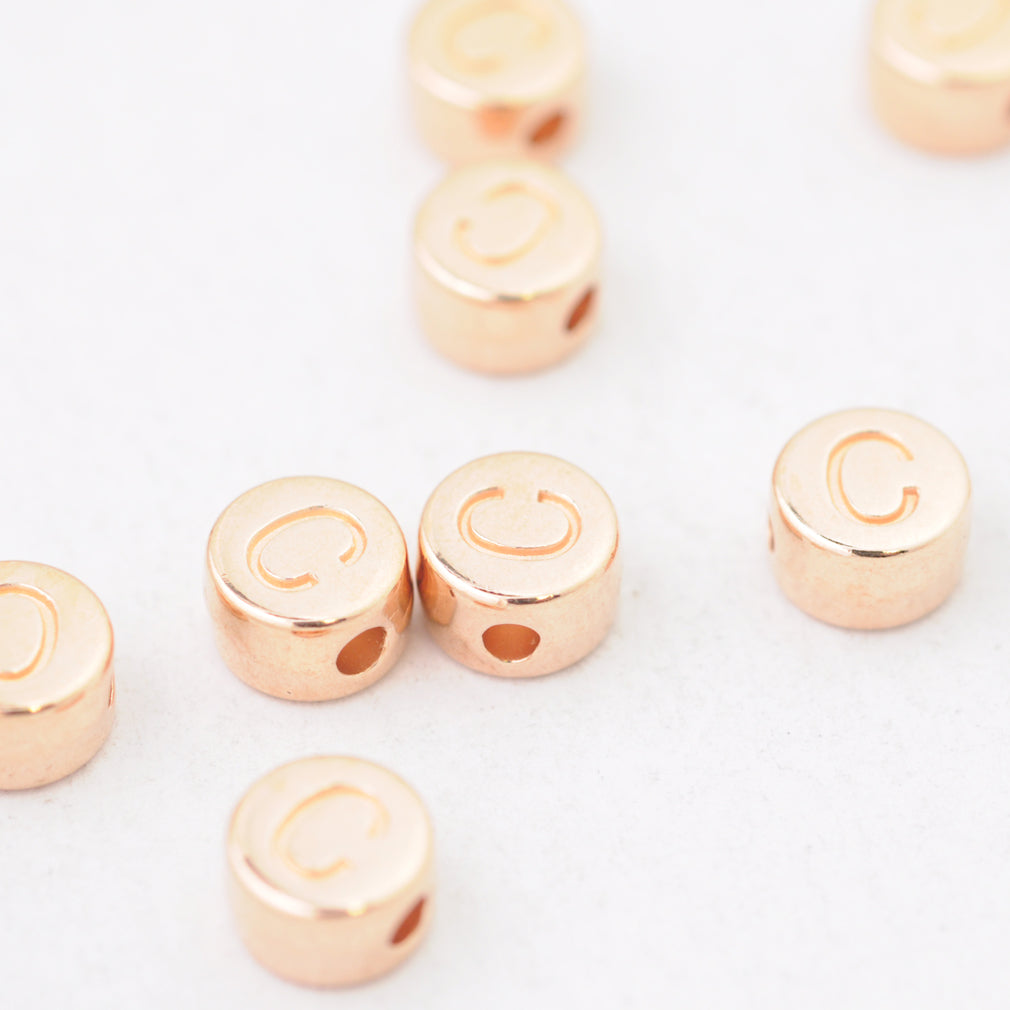 Letter A / rose metal / Ø 7mm