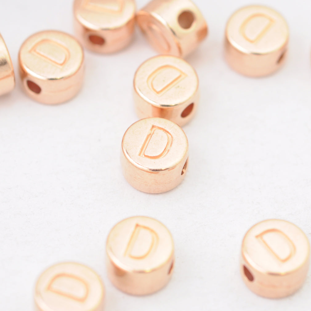 Letter A / rose metal / Ø 7mm
