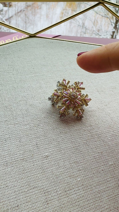 Christmas brooch snowflake strass rotating / gold colored / 30mm