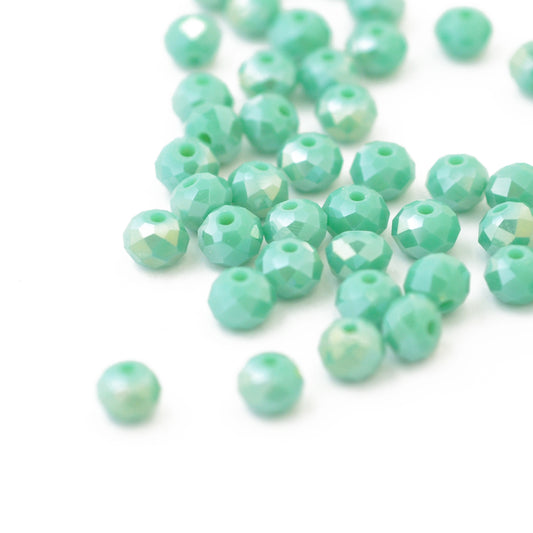 Briolette faceted mint green luster / 6mm