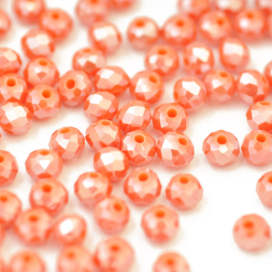 Briolette faceted coral luster / 6mm