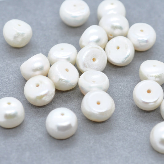 Freshwater pearls round flattened / approx. Ø 7x4 mm