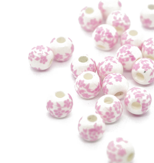 Porcelain bead flower pink / Ø 6 mm