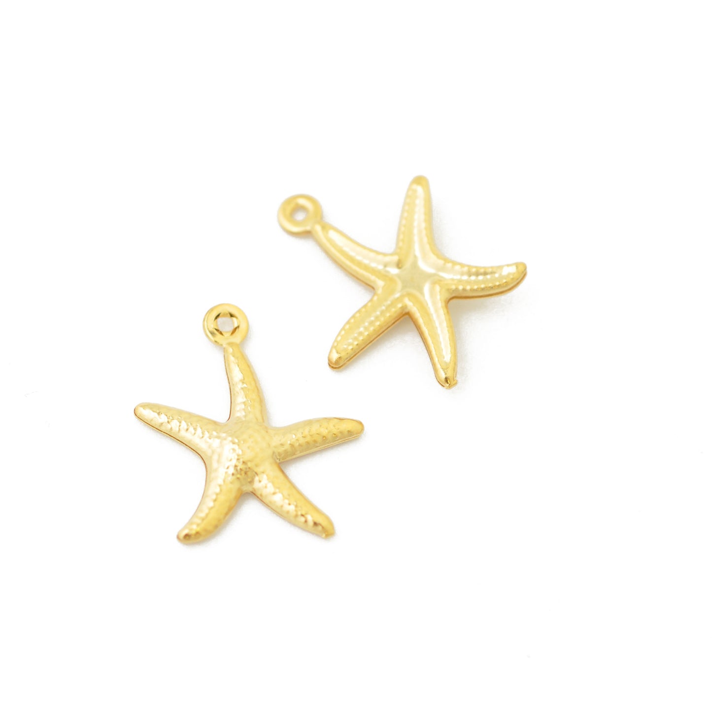 Stainless steel starfish pendant / gold plated / Ø 16mm