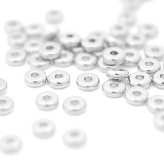Stainless steel disc donut spacer / silver colored / Ø 6 mm