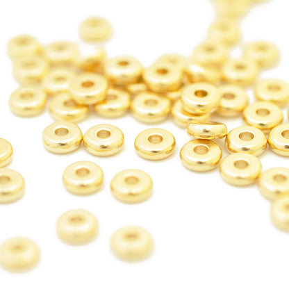 Stainless steel disc donut spacer / gold plated / Ø 6 mm