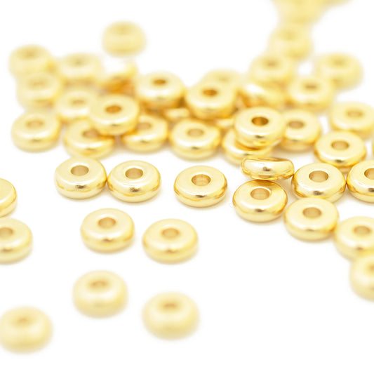 Stainless steel disc donut spacer / gold plated / Ø 6 mm