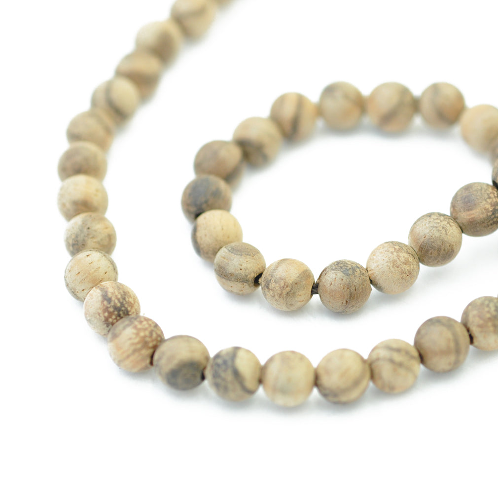 Sandalwood strand // grey-brown approx. 65 pcs. // Ø 6mm