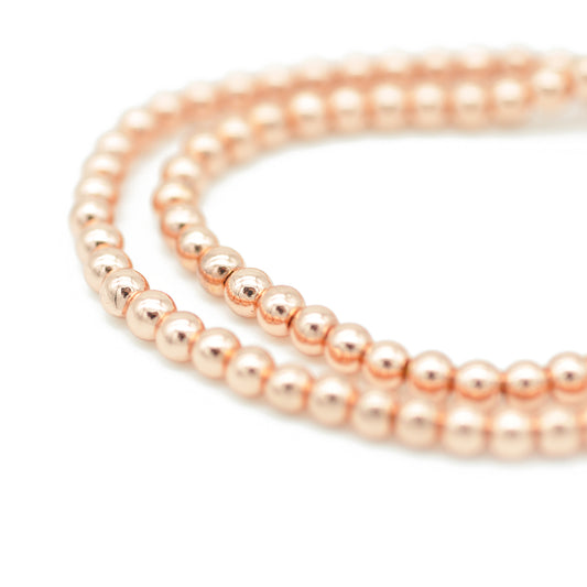 Strang Glasperlen / roségold bedampft rund / Ø 4 mm