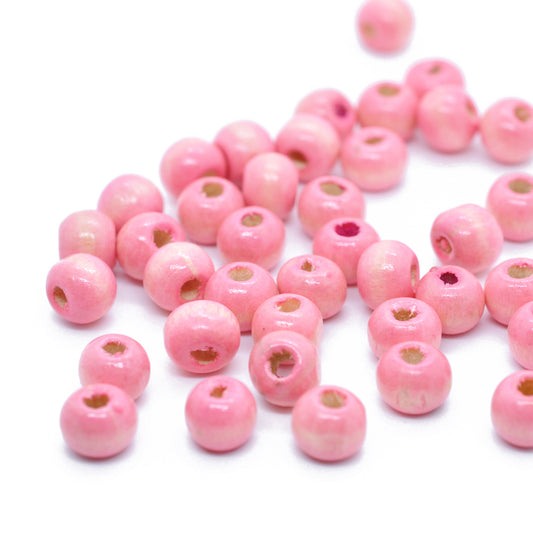 Wooden beads / pink / 100 pcs. Ø 7 mm