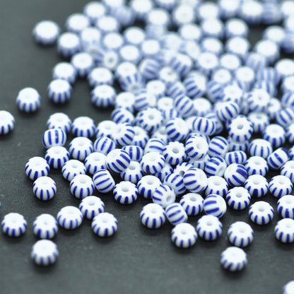 Preciosa Rocailles / blau weiss gestreift  9/0   Ø 2,6mm / 17gr.