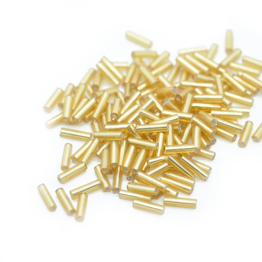 Rocailles Stifte / gold silbereinzug 5x2mm / 11gr.