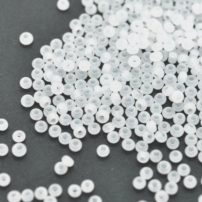 Preciosa Rocailles / white opal 9/0 / Ø 2.6mm / 15gr.