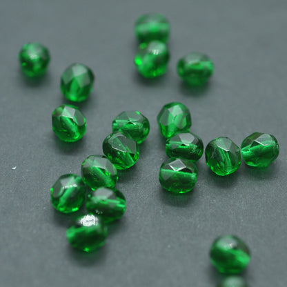 Preciosa faceted glass beads / dark green / 50 pcs. / 6mm