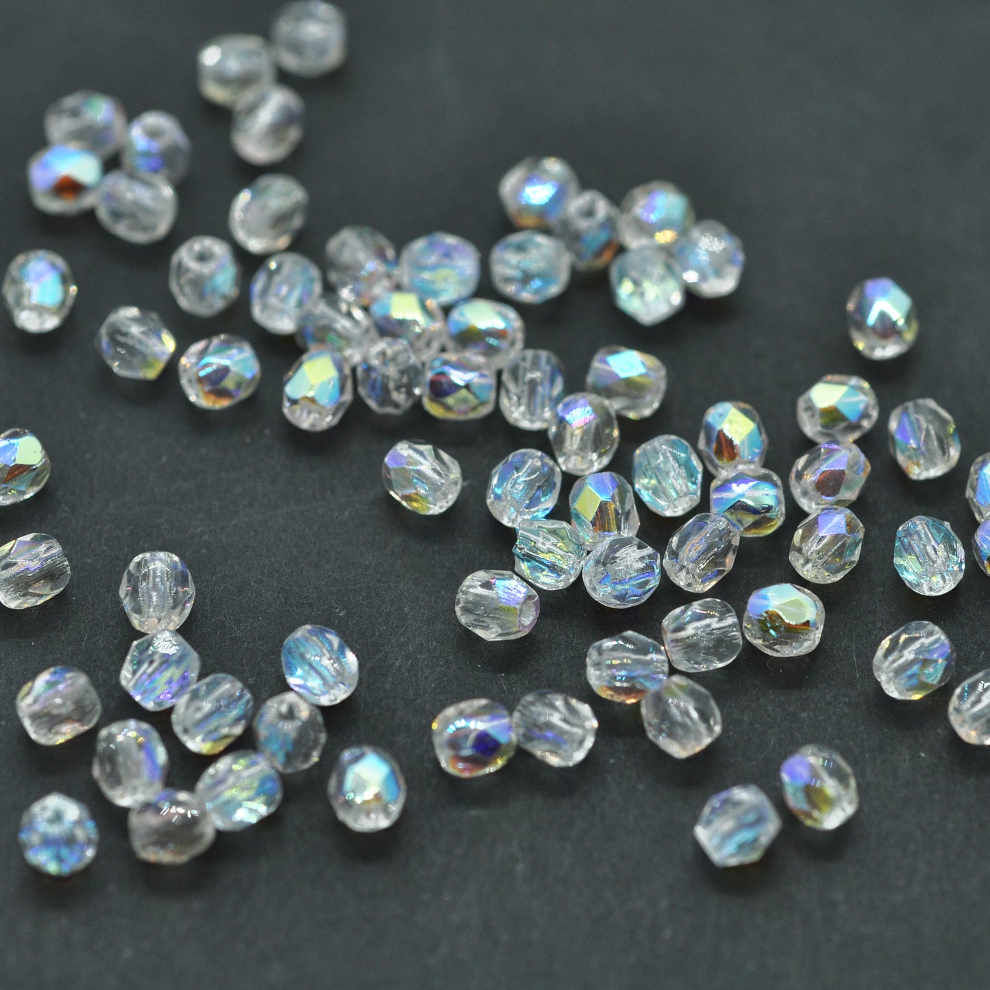Preciosa ground glass beads / crystal AB / 100 pcs. / 3mm