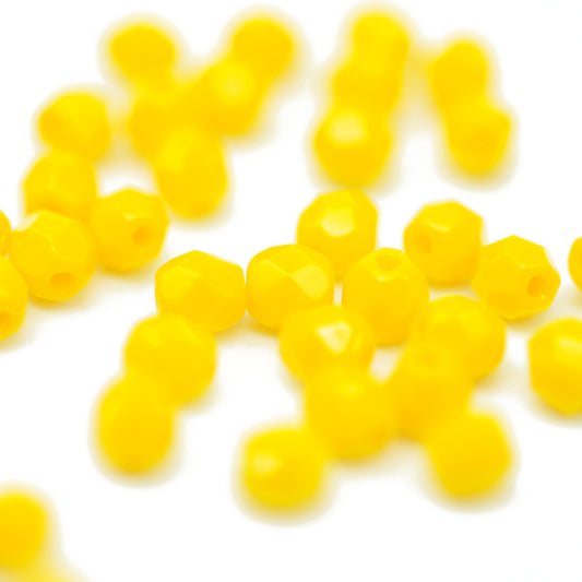 Preciosa ground glass beads / yellow opaque / 100 pcs. / 4mm