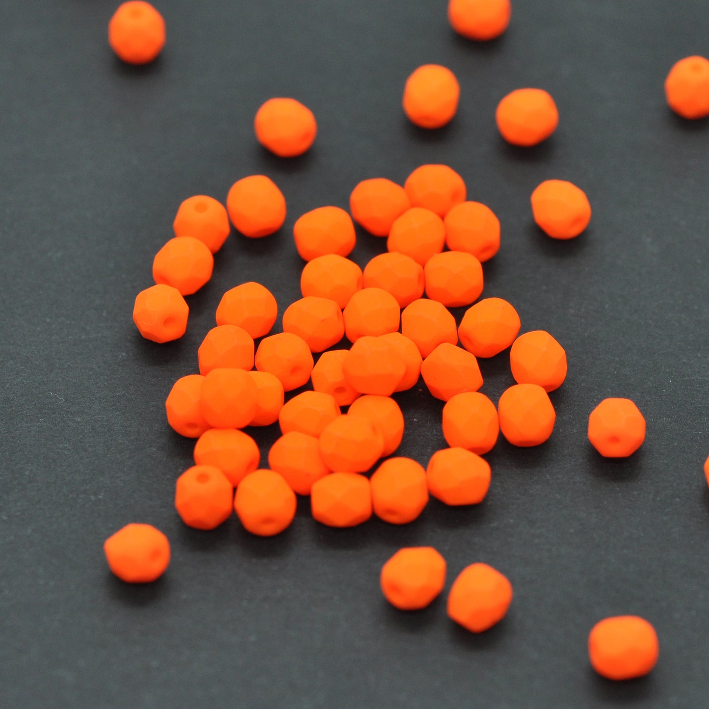 Preciosa ground glass beads / neon orange / 100 pcs. / 4mm