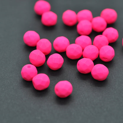 Preciosa faceted glass beads / neon pink / 6mm