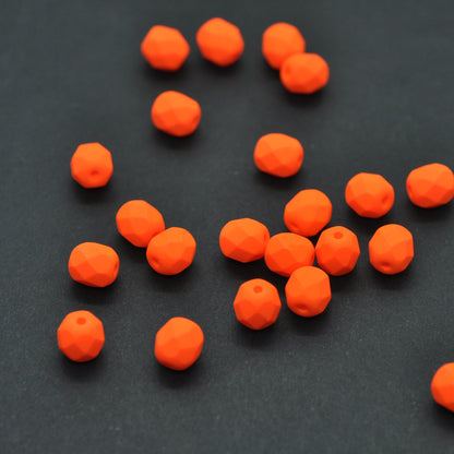Preciosa faceted glass beads / neon orange / 6mm