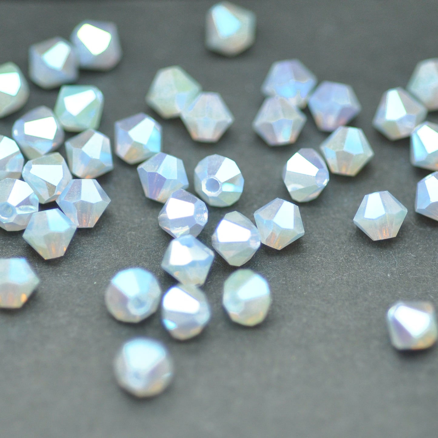 Preciosa Bicone Rondelle Bead / Light Sapphire Opal 2AB / 50 Stk. / Ø 4mm