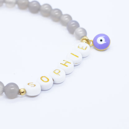Gemstone bracelet with individual name / gray agate / purple evil eye