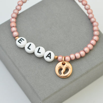 Children / baby bracelet with little feet pendant