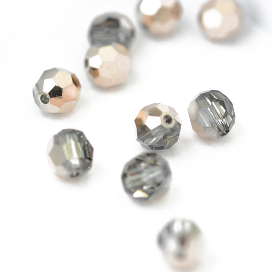 Swarovski round faceted / Crystal Rose Gold / 10 pcs. / Ø 6mm