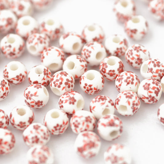 Porcelain bead flower red / Ø 6 mm
