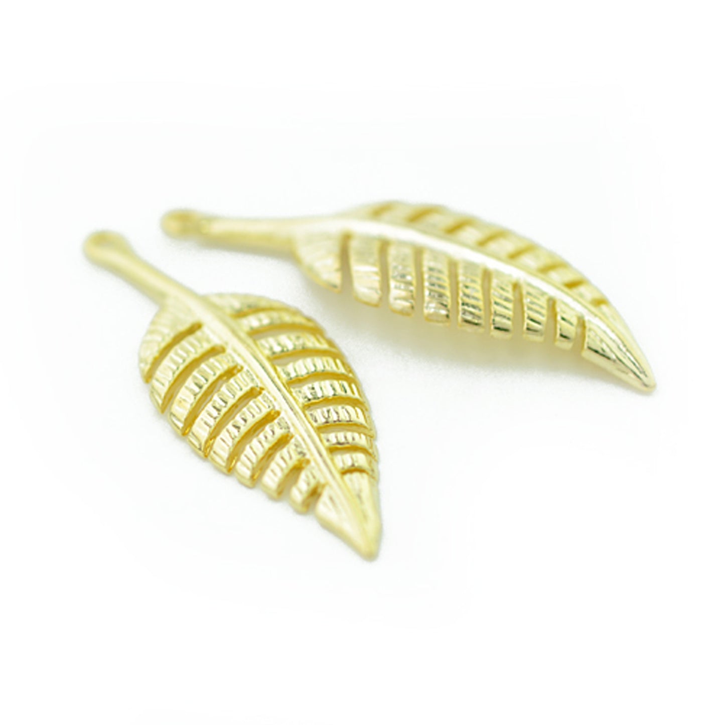 Fern leaf pendant / gold colored / 32 mm