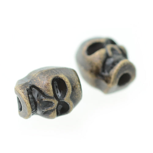 Skull element / brass colored / 9 mm