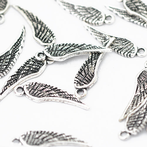 Wing pendant / silver colored / 24 mm