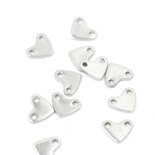 Mini stainless steel heart connector / silver colored / Ø 6 mm