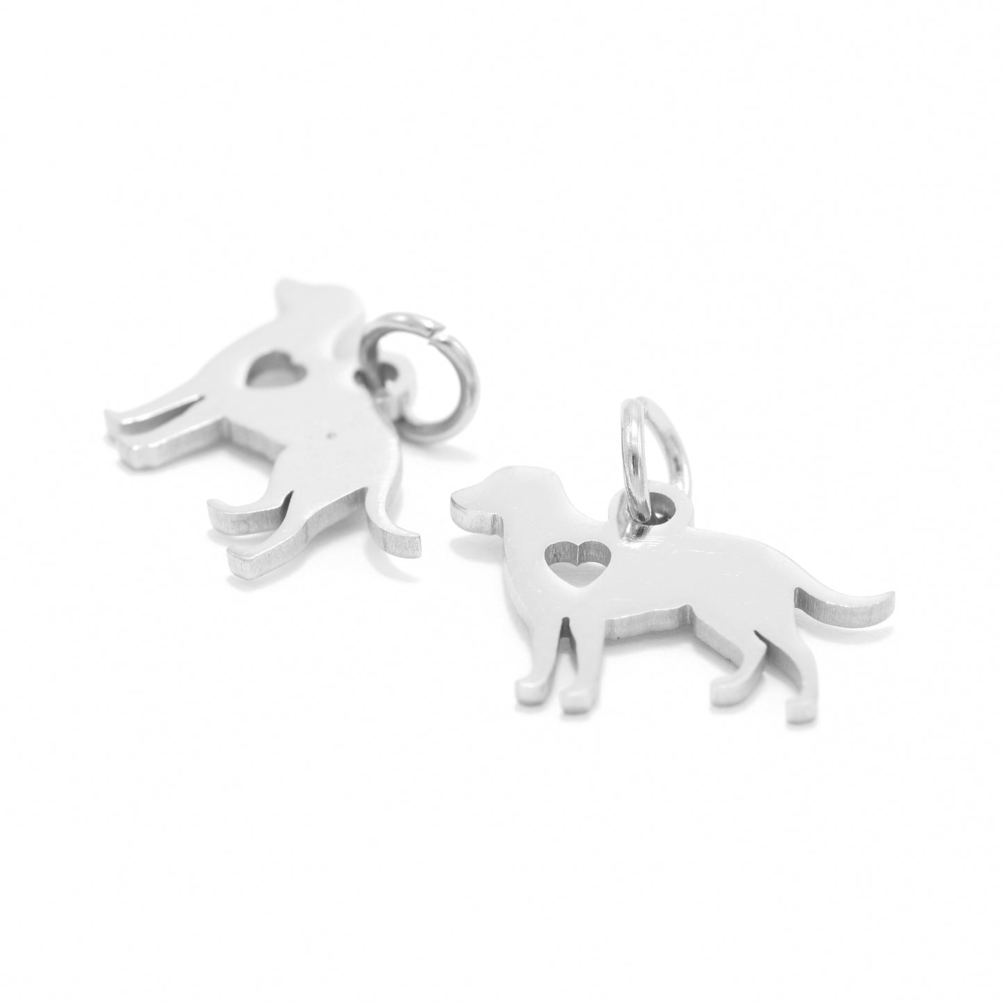 Dog with heart pendant stainless steel / silver colored / 20 mm