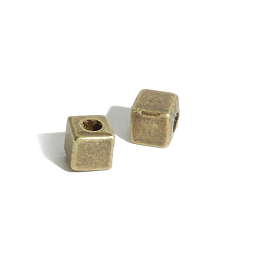 Dice Spacer / brass colored / 4 mm
