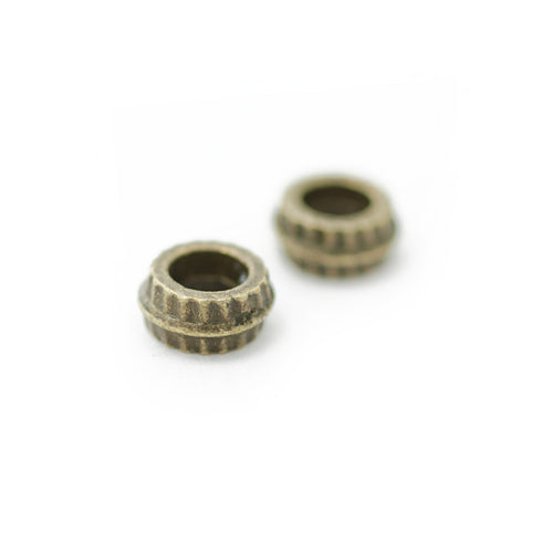 Ring Spacer Element / brass colored / Ø 7 mm