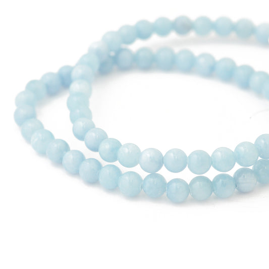 Strand of jade dyed / baby blue / Ø 6 mm (120--048)